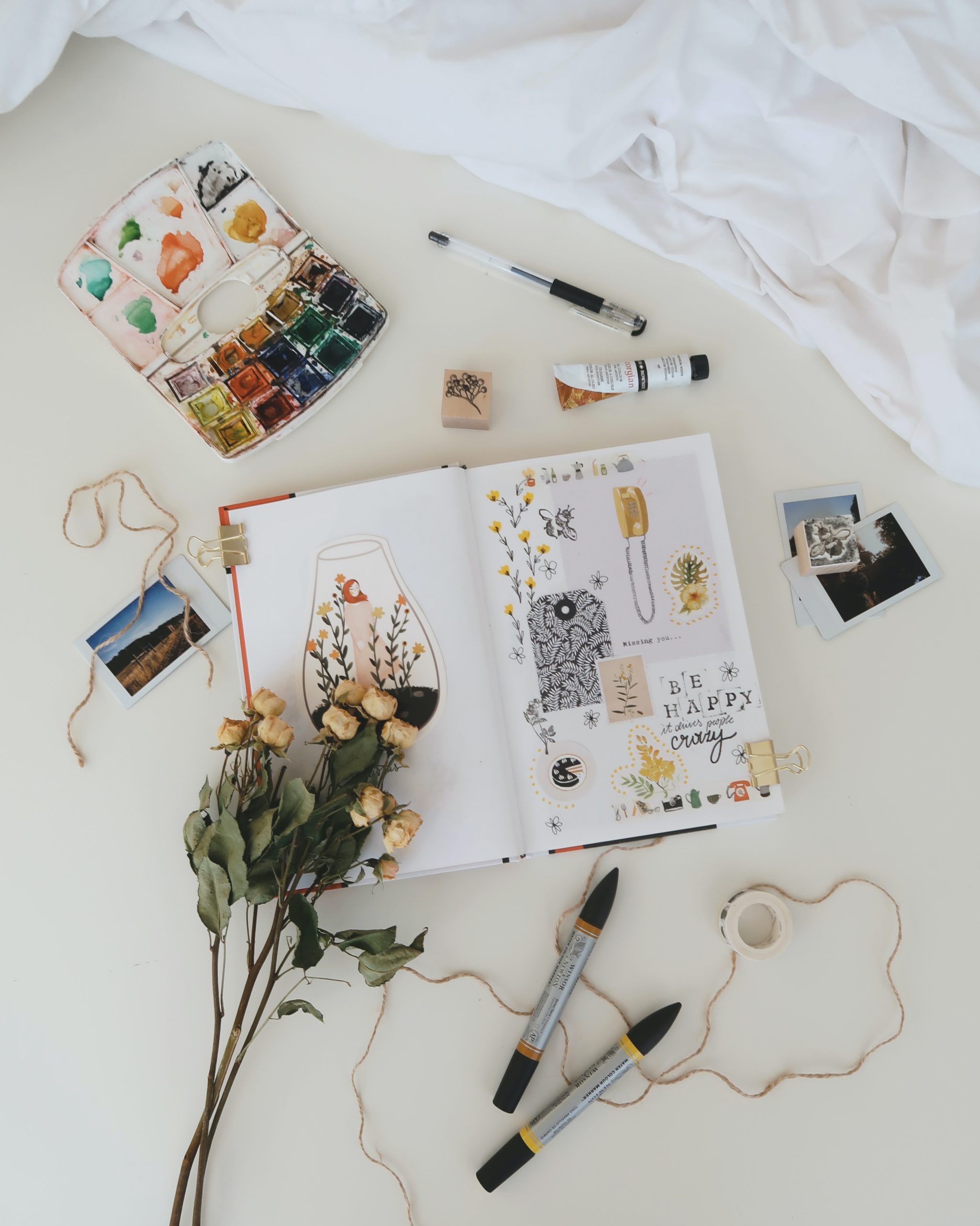 67: What to Journal About When You Don't Know Where to Start an open journal with watercolor paint next to it