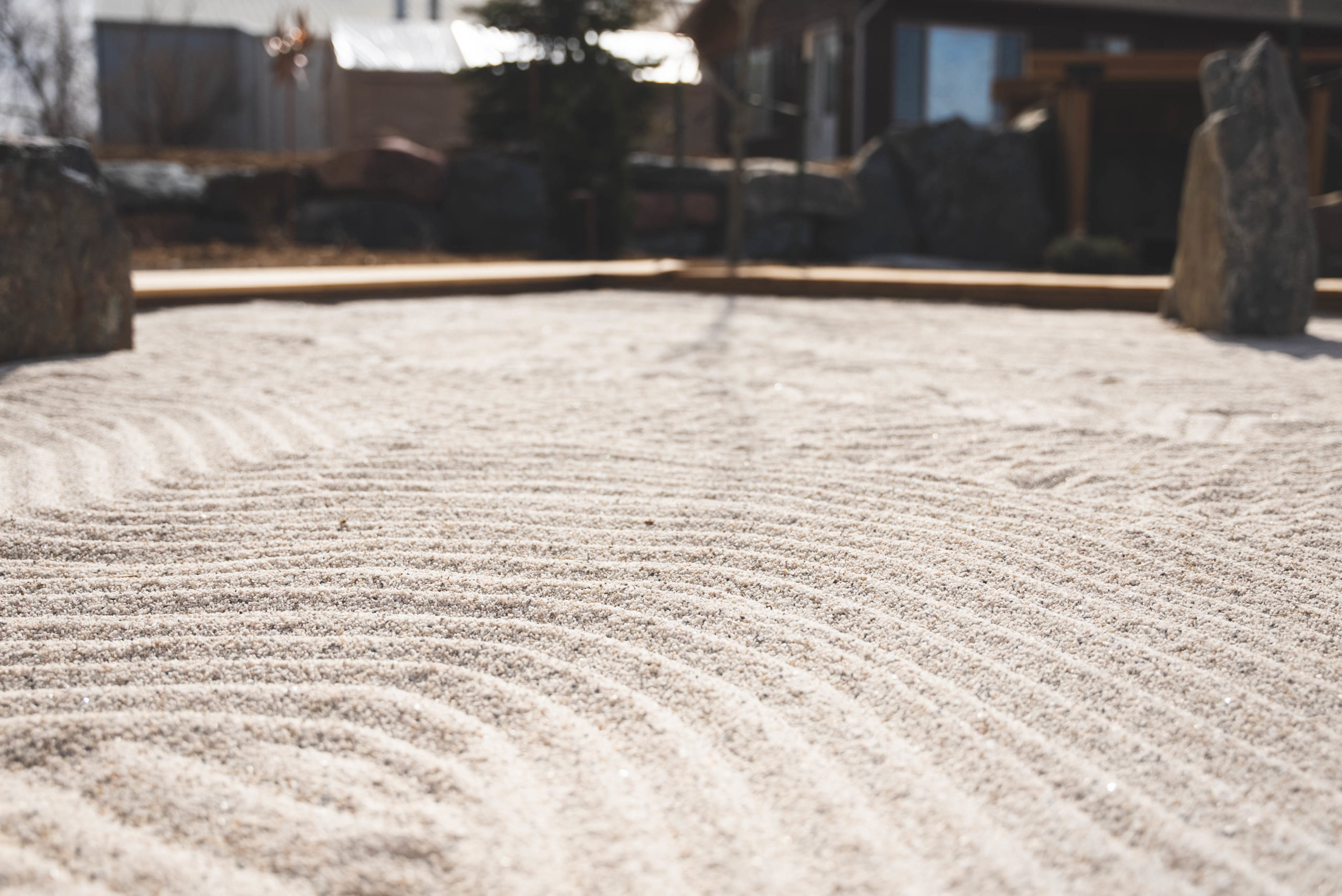 Gardens Spotlight: The Raking Garden close up of white sand with lines in it