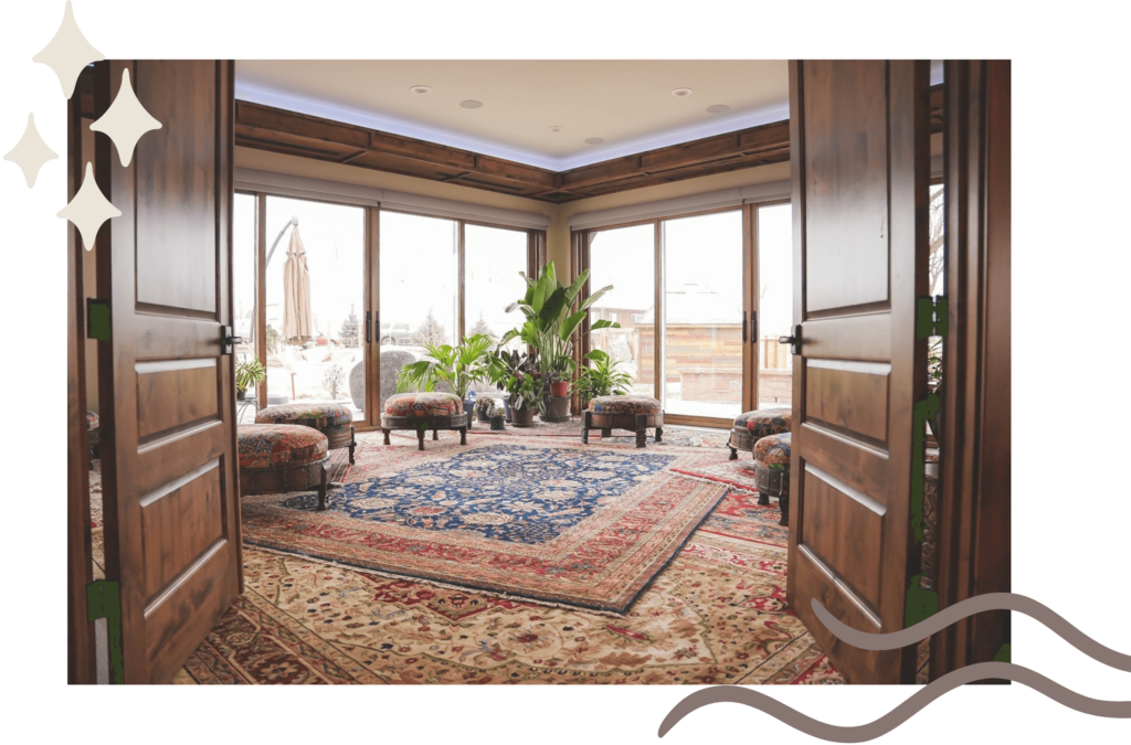 Self Care Community Room At Beam And Bell With Comfy Stools and Ornate Rugs