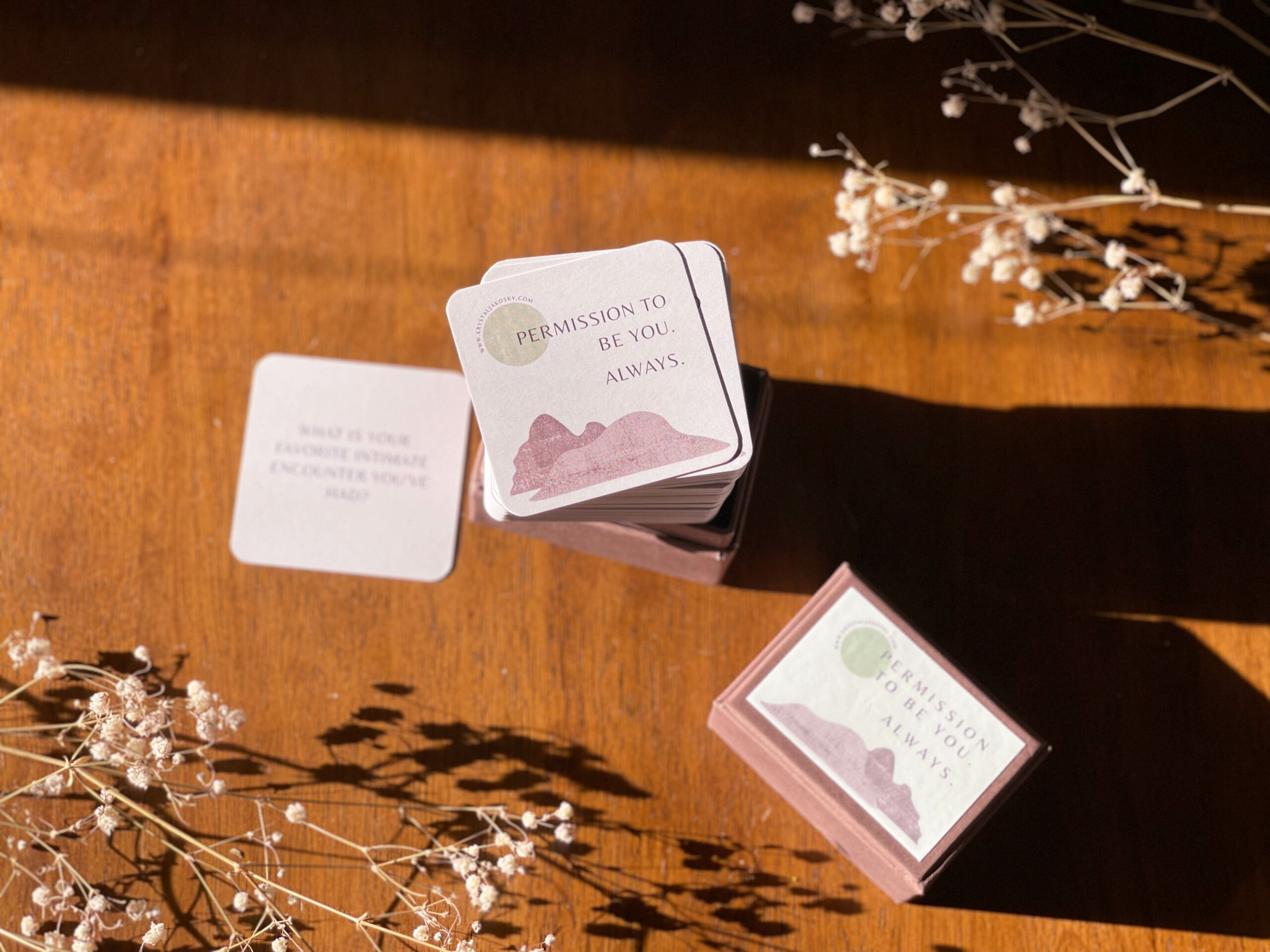 "Permission to be you. Always." Journaling Prompts Cards a deck of purple and tan cards on a wooden surface