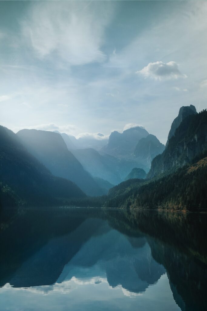 91: What Do You Need to Let Go Of? blue mountains reflecting on water