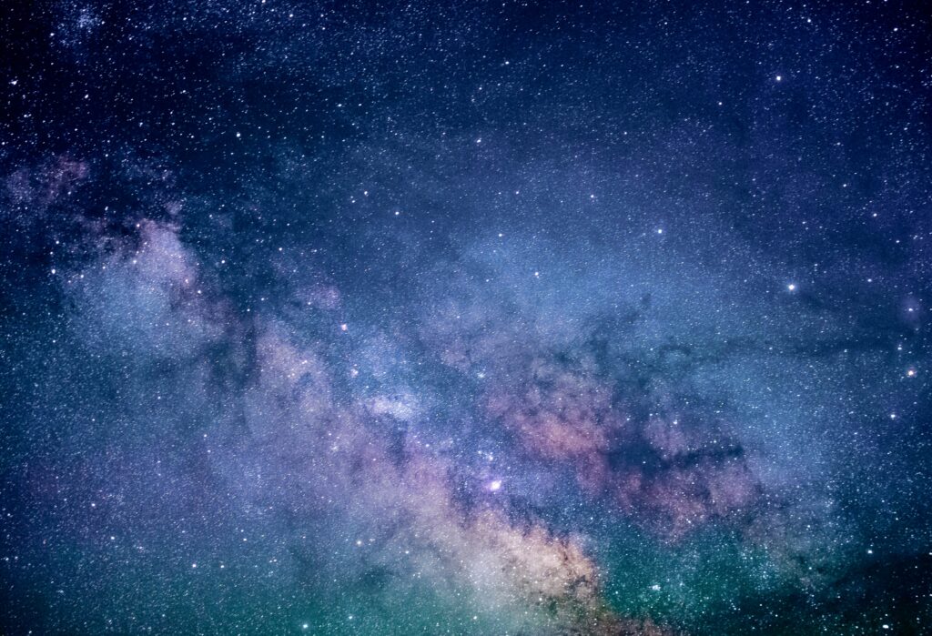 107: Past Life Regression Meditation Guided by Kevin Pennell close up of night sky with blue and purple stars