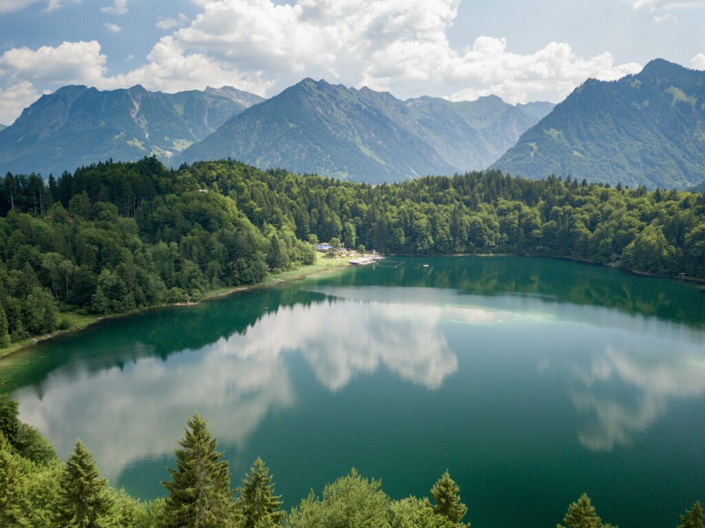 My Journey to the Lake a wide photo of a clear blue lake in the mountains